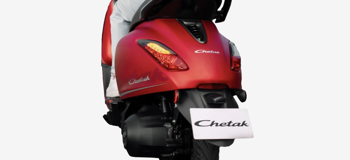 Bajaj Chetak electric scooter Scarlet Red rear view shows tail light and turn lights