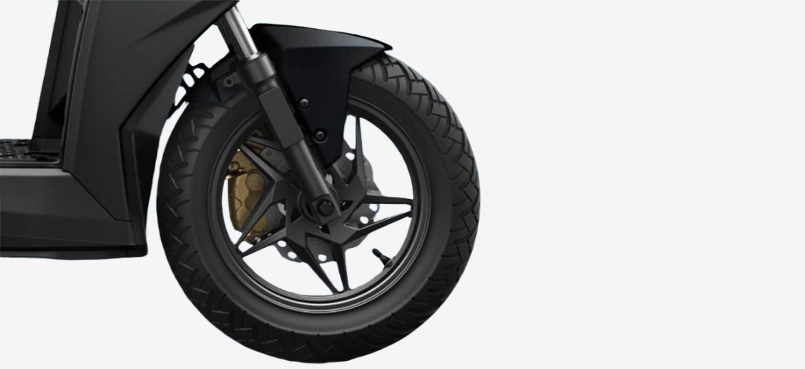 Simple One S front suspension, mudguard and front tyre close-up