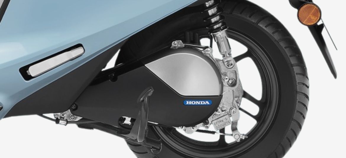 Honda Activa e rear wheel pmsm motor with integrated frame and power unit