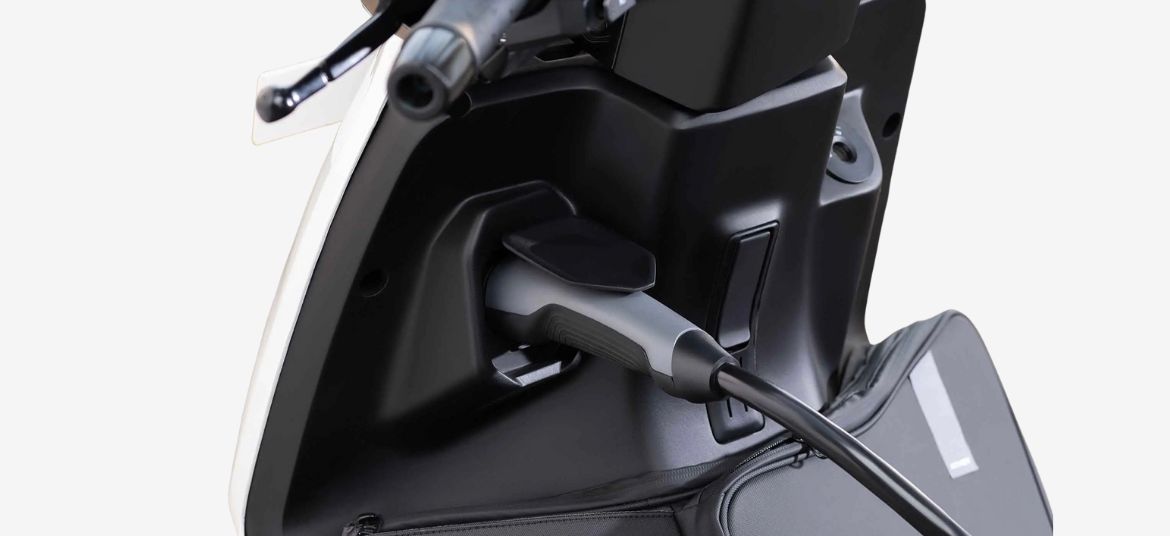 Ather Rizta S electric scooter charging port and charger detail
