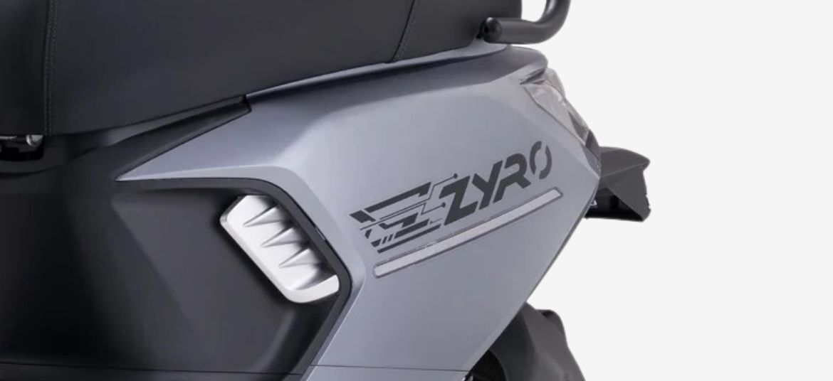 Lectrix ZYRO LA 60V branding logo on silver body panel of electric scooter